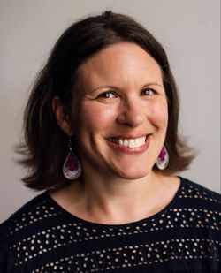 A portrait of Sara Clarke.