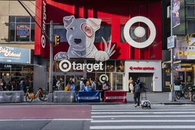 People walk in front of a Target store in Times Square in New York City