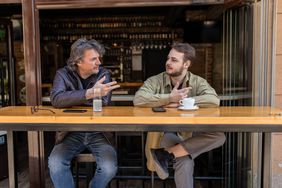 Two friends having coffee