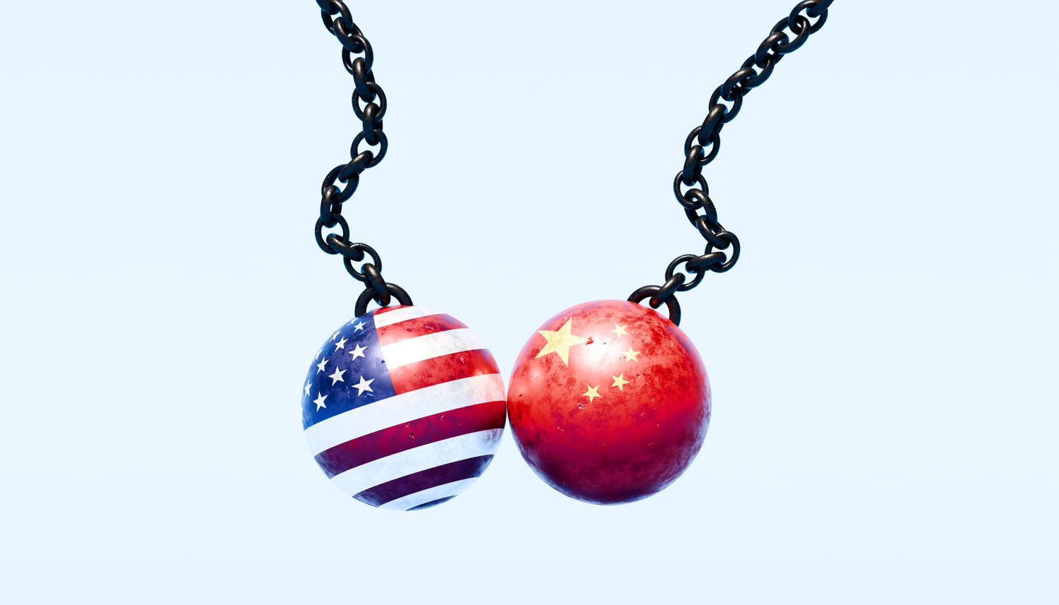 An image of two wrecking balls, one draped in the American flag and the other in the Chinese flag, colliding mid-air. 