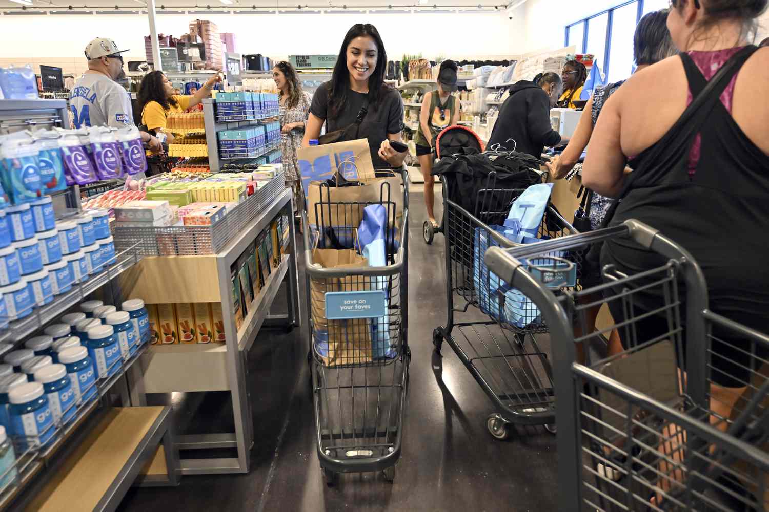 Guests make their purchases during the grand opening of Nordstrom Rack at Best of the West shopping center on May 18, 2023 in Las Vegas, Nevada.