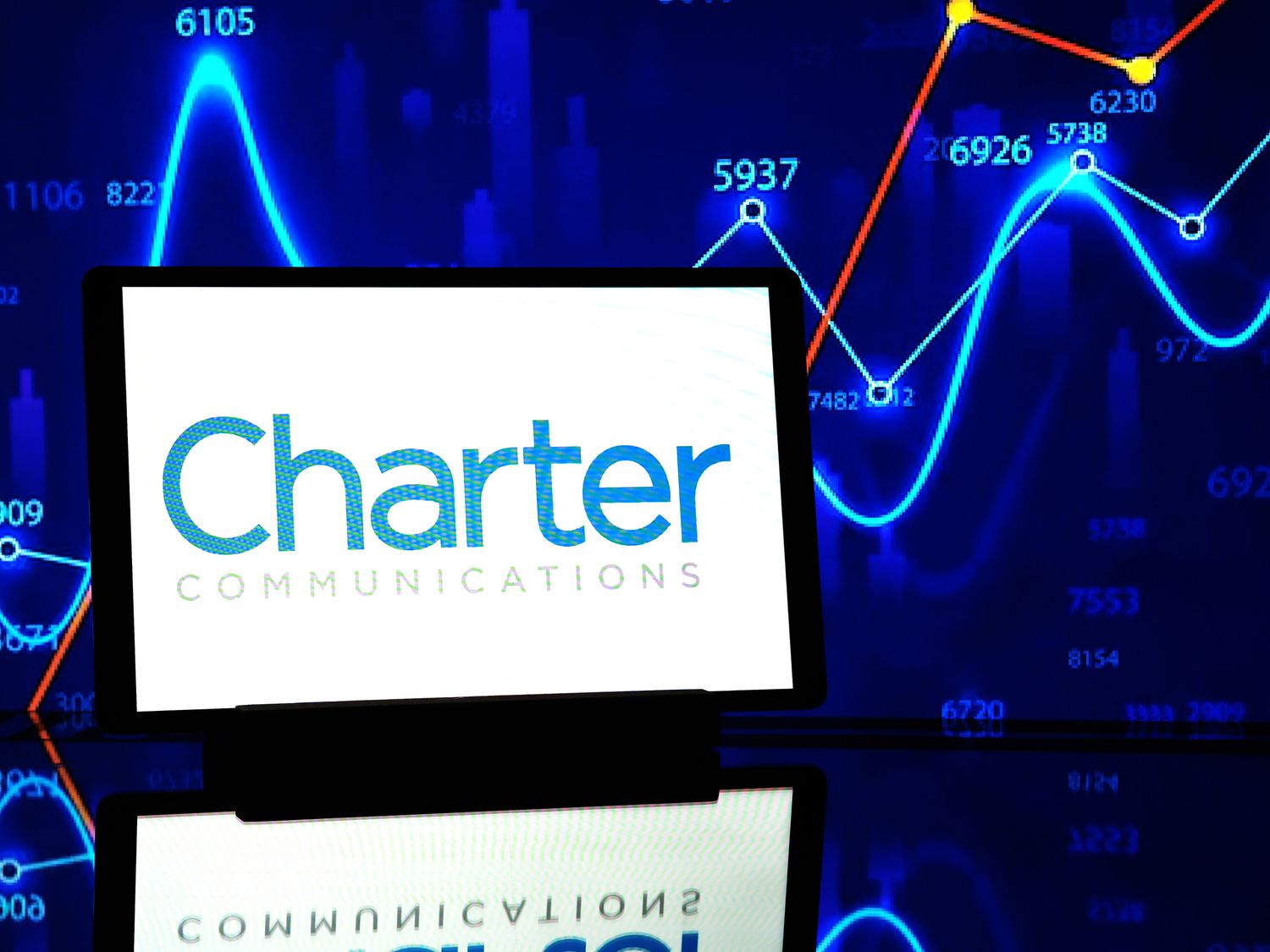 Charter Communications, Inc. logo seen displayed on a tablet