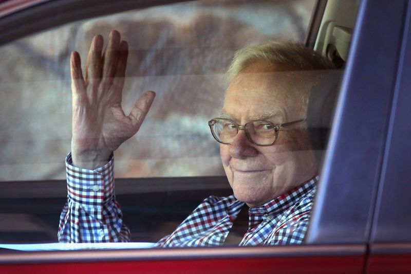 Warren Buffett waving from his car in an undated photo.