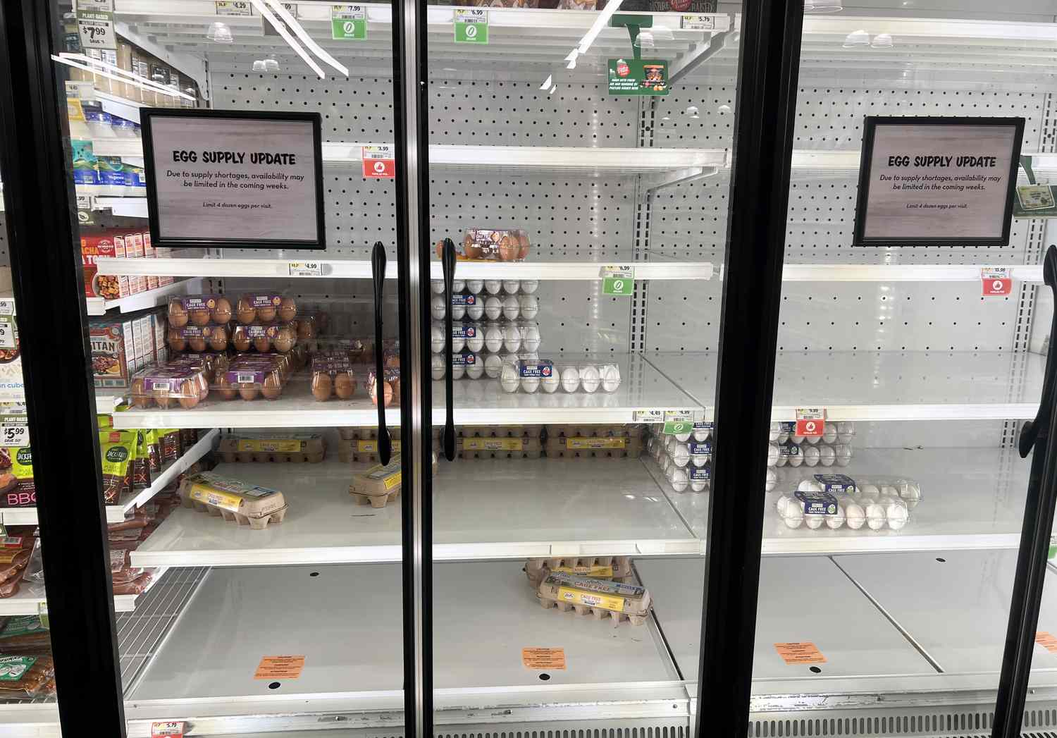 A sign indicates that, 'due to supply shortages, availability may be limited in the coming weeks', in the egg section of a grocery store on January 23, 2025 in Miami, Florida.