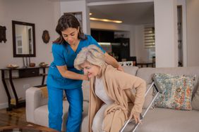 Senior getting help from nurse paid through in-house support from Medicare.