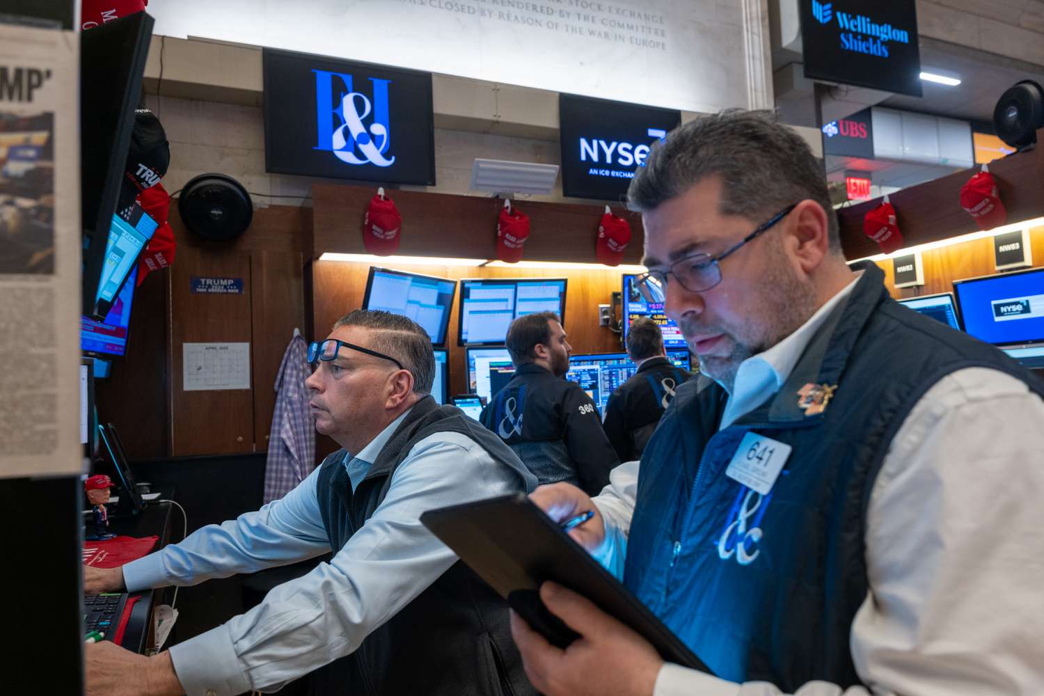 Traders work on the floor of the New York Stock Exchange