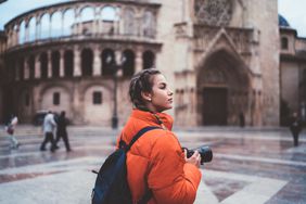 Traveler with camera enjoying Valencia