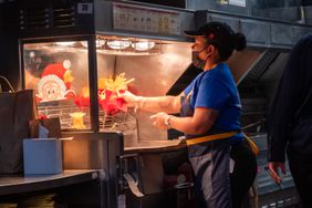 A worker at a New York City McDonald's restaurant earlier this year. 
