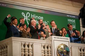 Hinge Health executives ring the opening bell during the company's IPO on Thursday