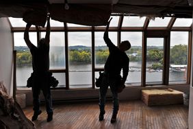 Contractors at work at a home in New York State. 