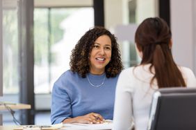 Financial advisor meeting with client about CD rates