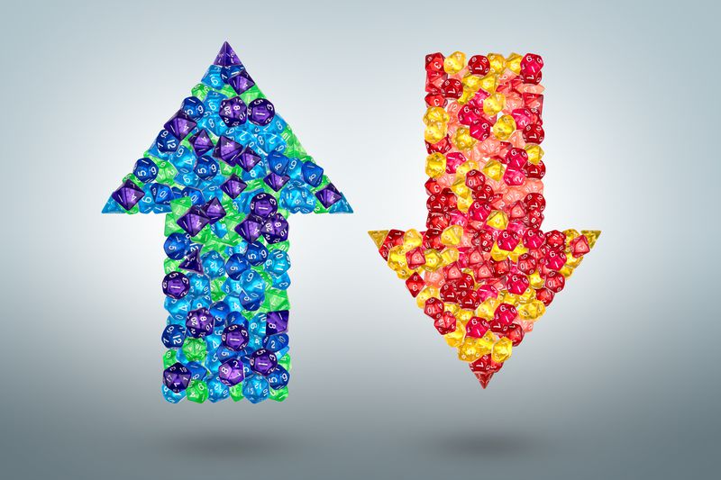 Colorful up arrow and down arrow in mid-air.