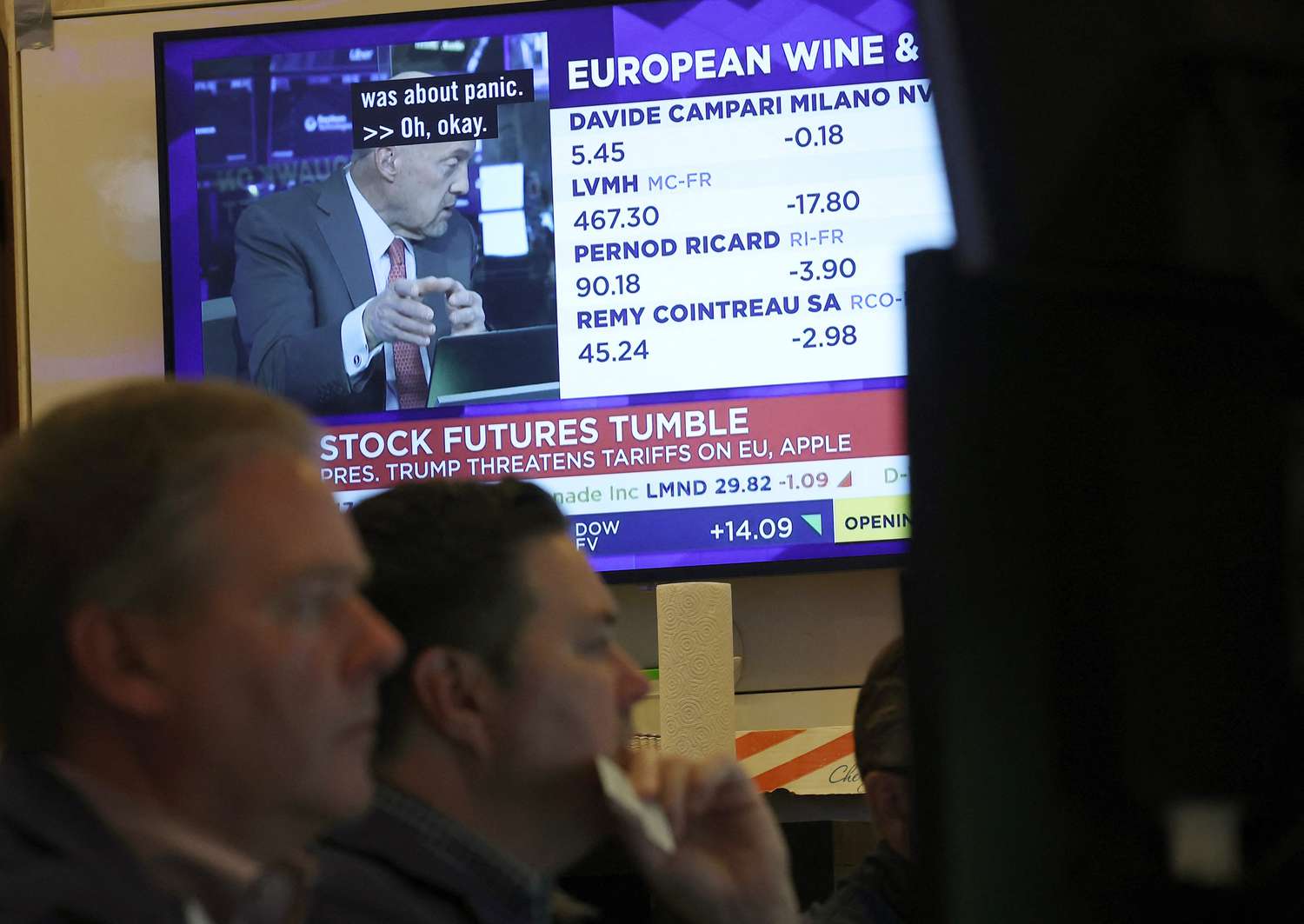 Traders work on the floor of the New York Stock Exchange (NYSE) at the opening bell on May 23, 2025, in New York City. 