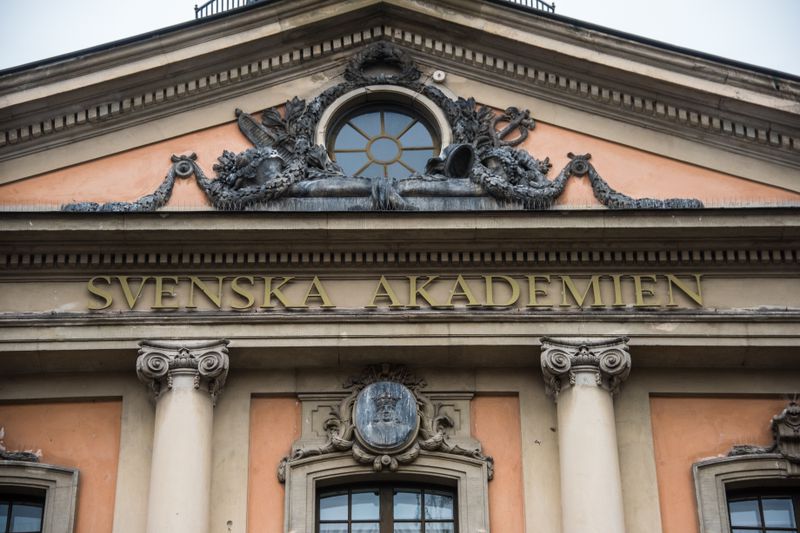Closeup view of the Swedish Academy sign on home of the Stockholm Stock Exchange building originally built in the 1770s.