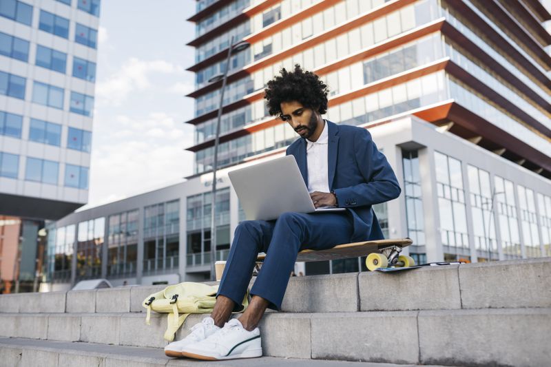 Young professional looks at ways to manage student loan payments during recession.
