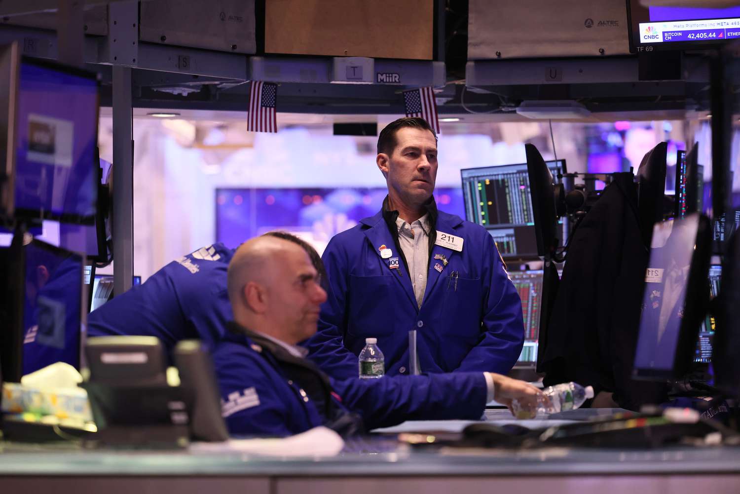 Traders work on the floor of the New York Stock Exchange.