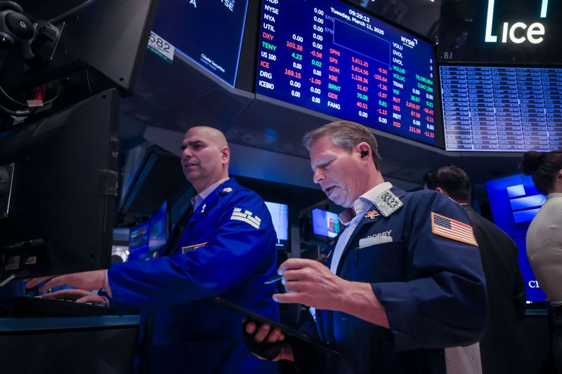 Traders work on the floor of the New York Stock Exchange