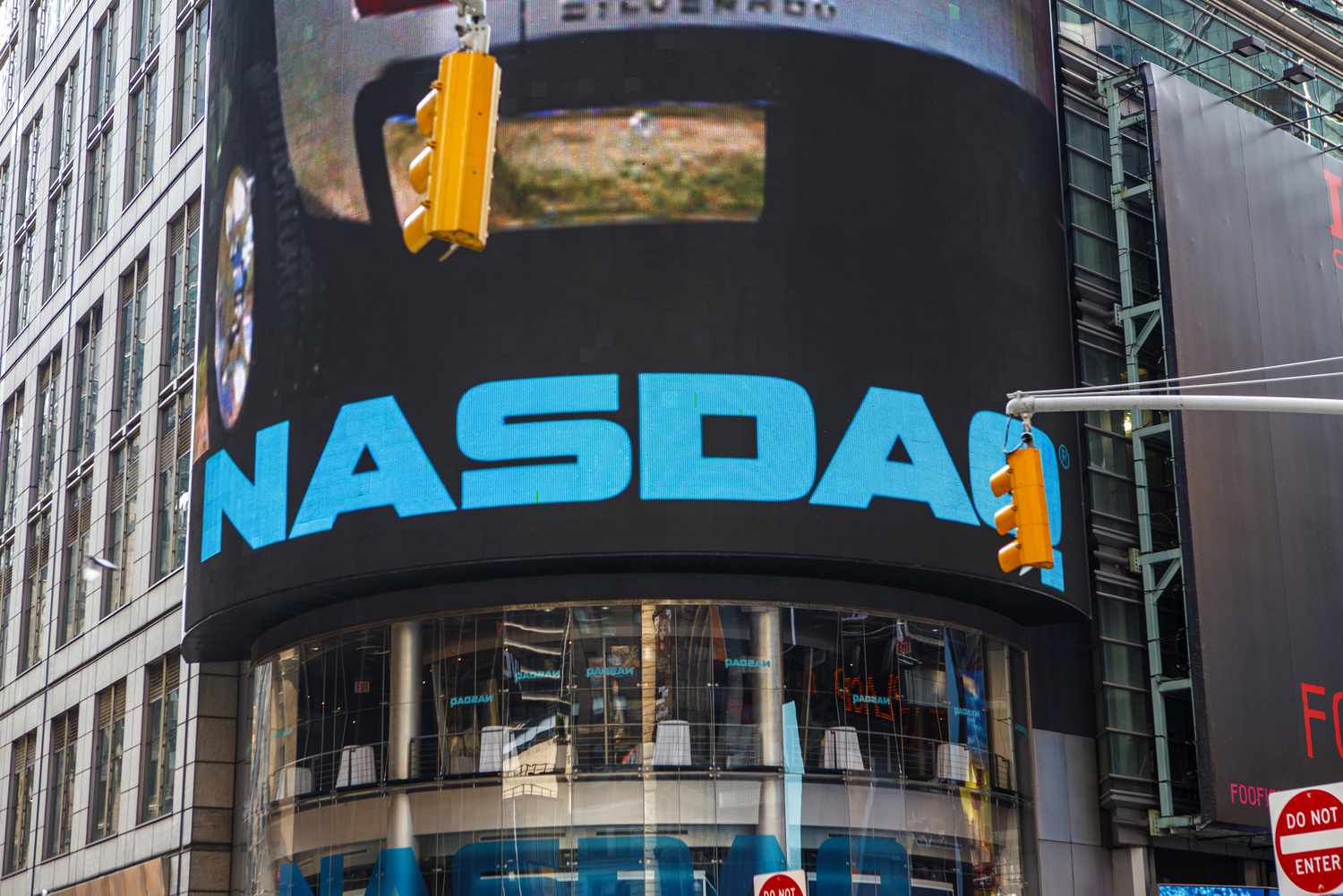 Street view of Nasdaq sign.