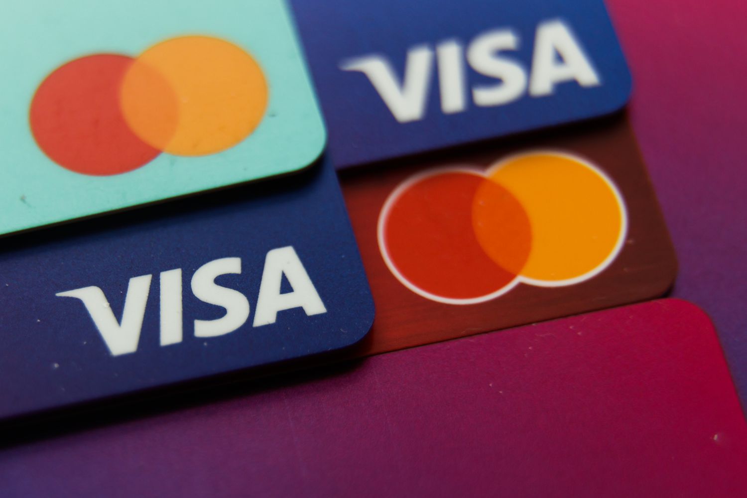MasterCard and Visa cards are seen in this illustration photo taken in Krakow, Poland, on March 29, 2024 