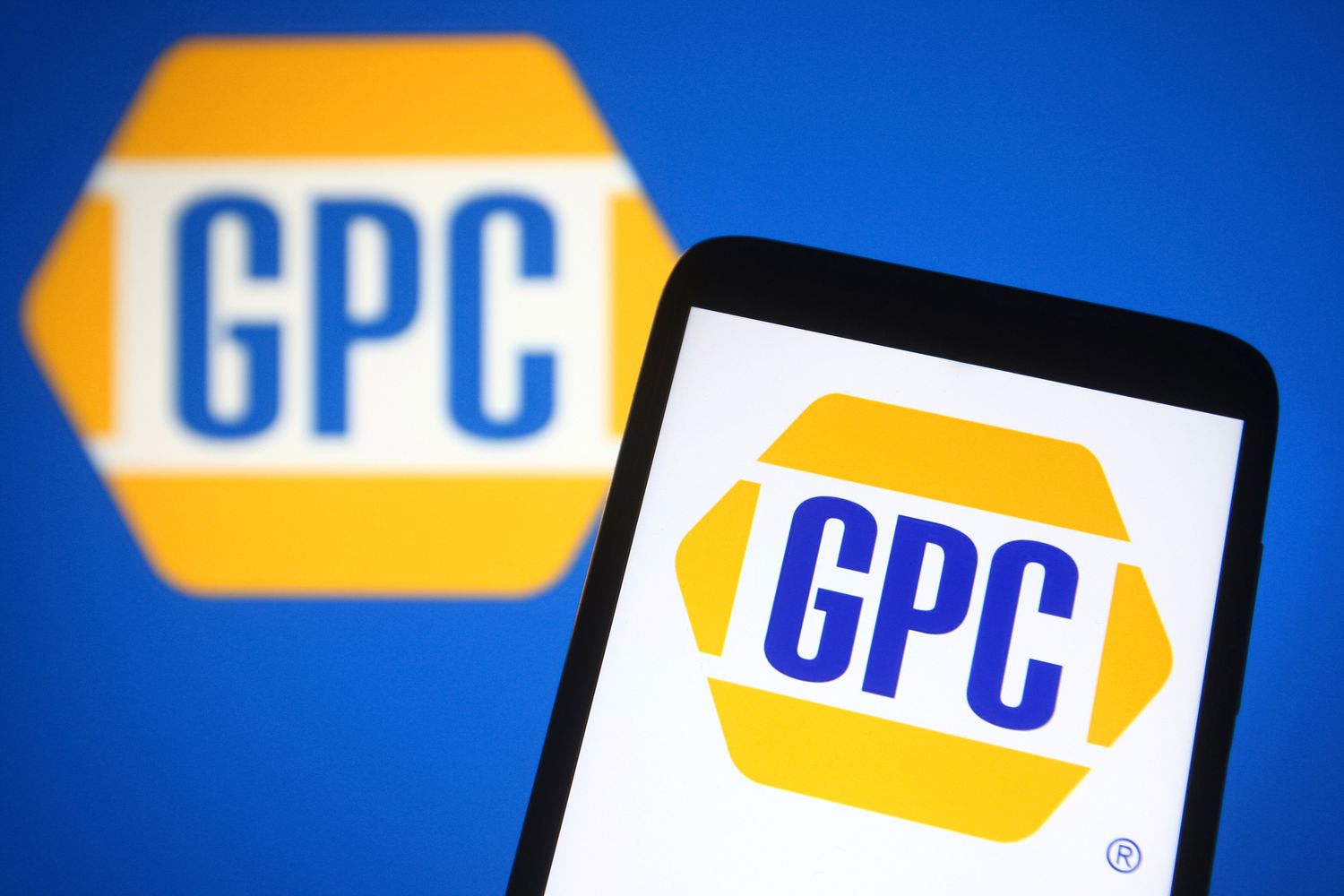 The GPC logo is displayed on a phone screen in front of a blue background also featuring the GPC logo.