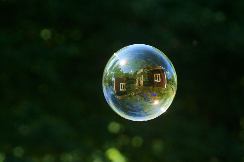House Reflecting On Soap Bubble