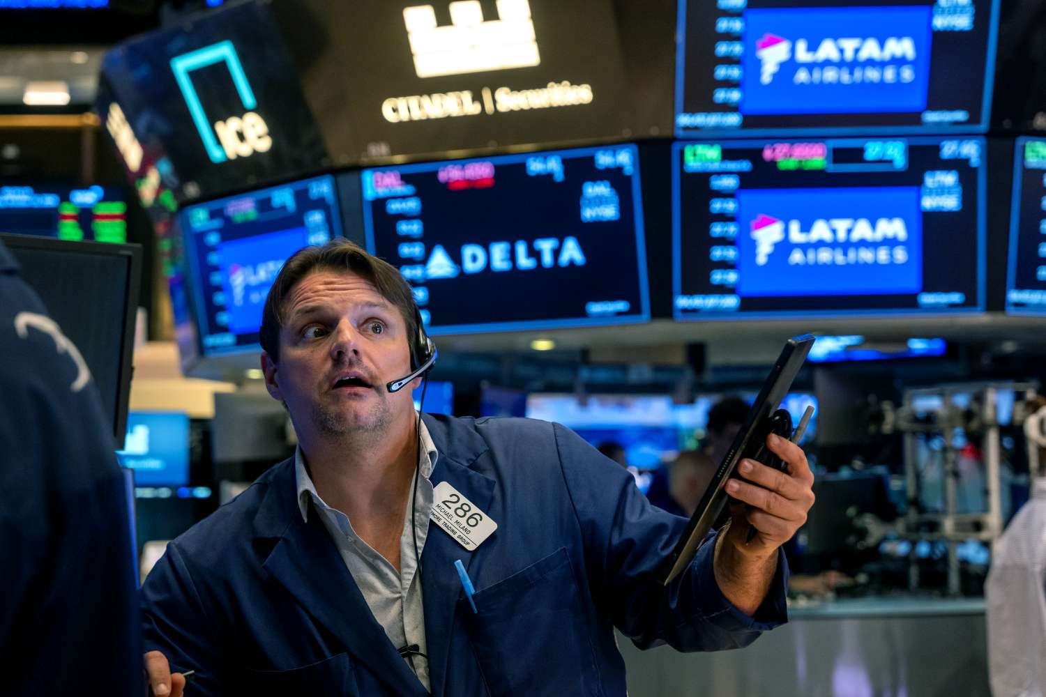 Traders work on the floor of the New York Stock Exchange