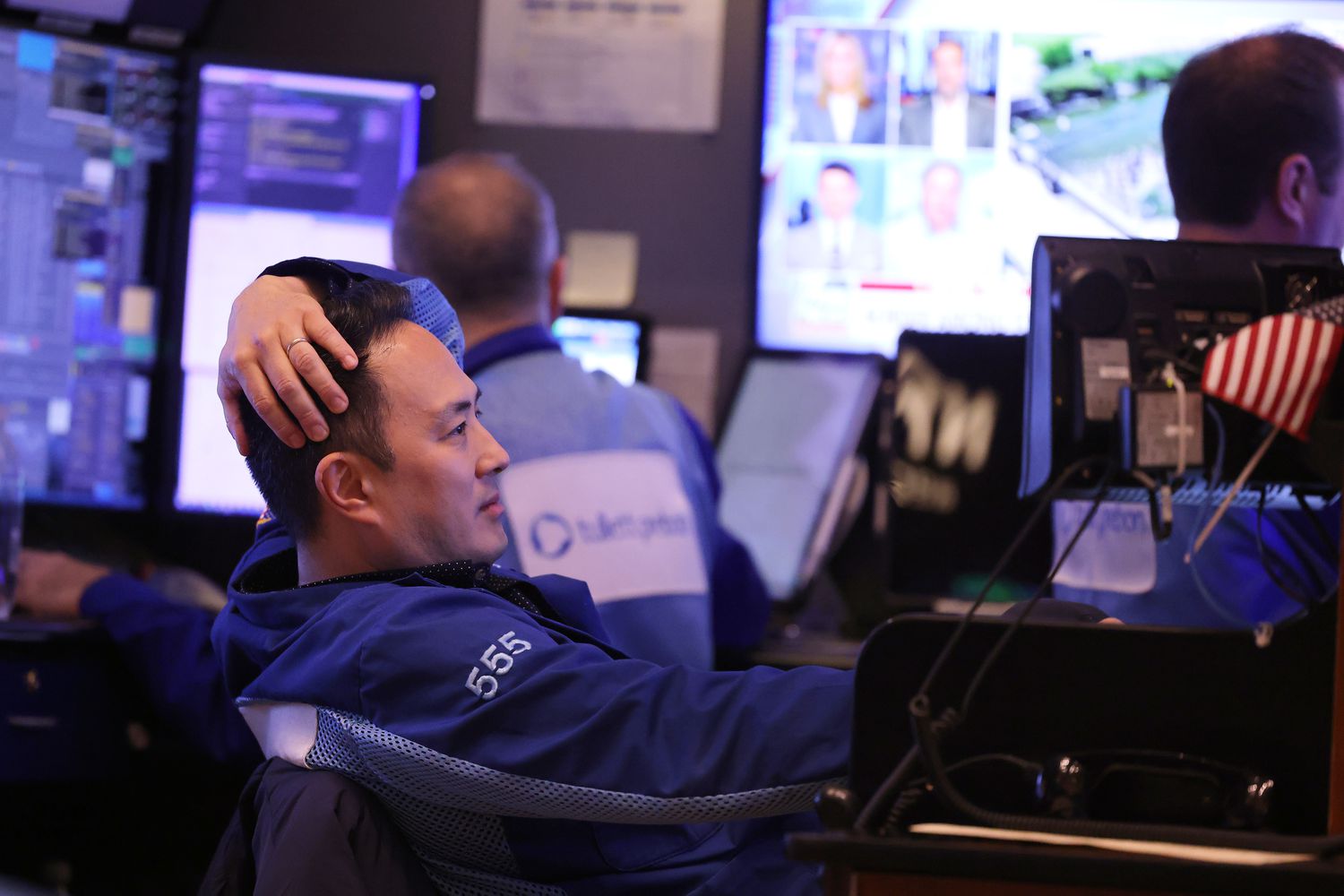 Traders work on the floor of the New York Stock Exchange.