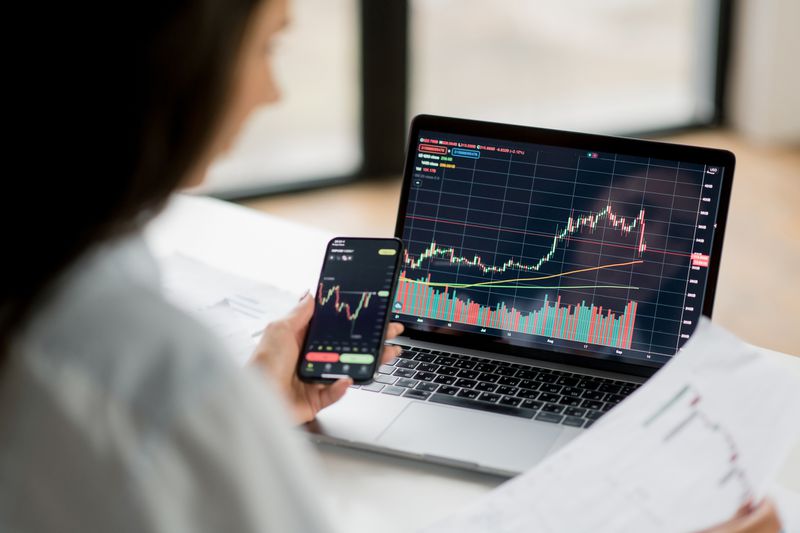 Currency trader checking prices