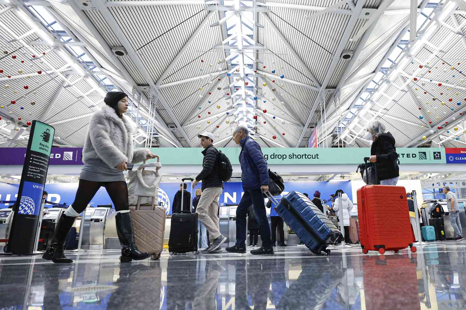 Travelers walk through O'Hare International Airport in Chicago in November. 