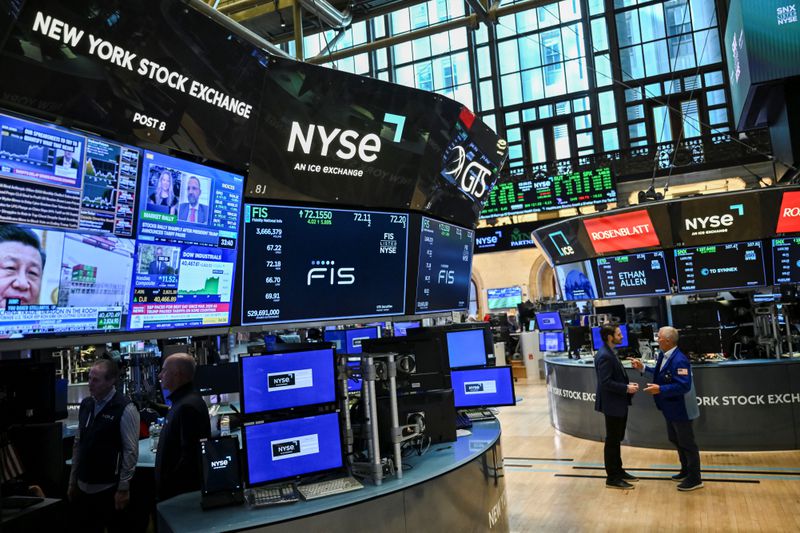 Traders work on the floor of the New York Stock Exchange