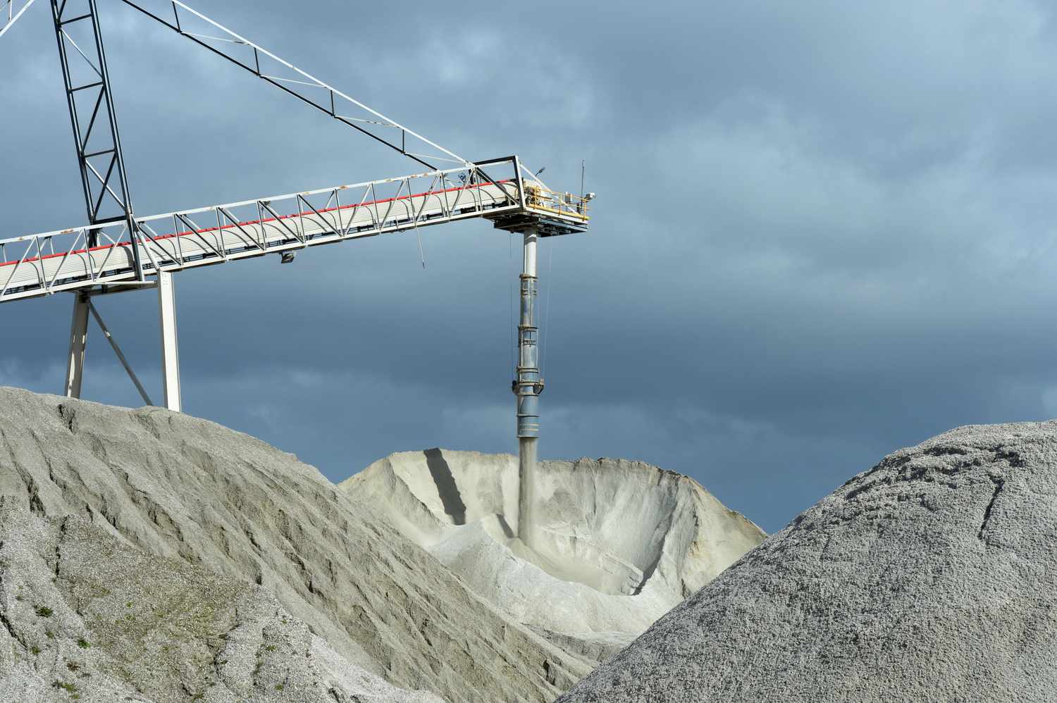 Lithium ore falls from a chute onto a stockpile at a facility in Australia. 