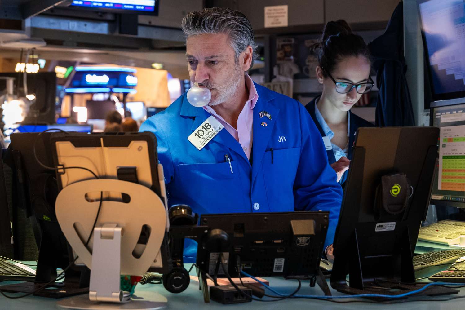 Traders work on the floor of the New York Stock Exchange.