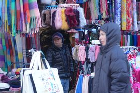 After the first snowfall of the year in New York City, United States, the freezing cold continues to affect the area, while people carry on with their daily lives on December 23, 2024. 