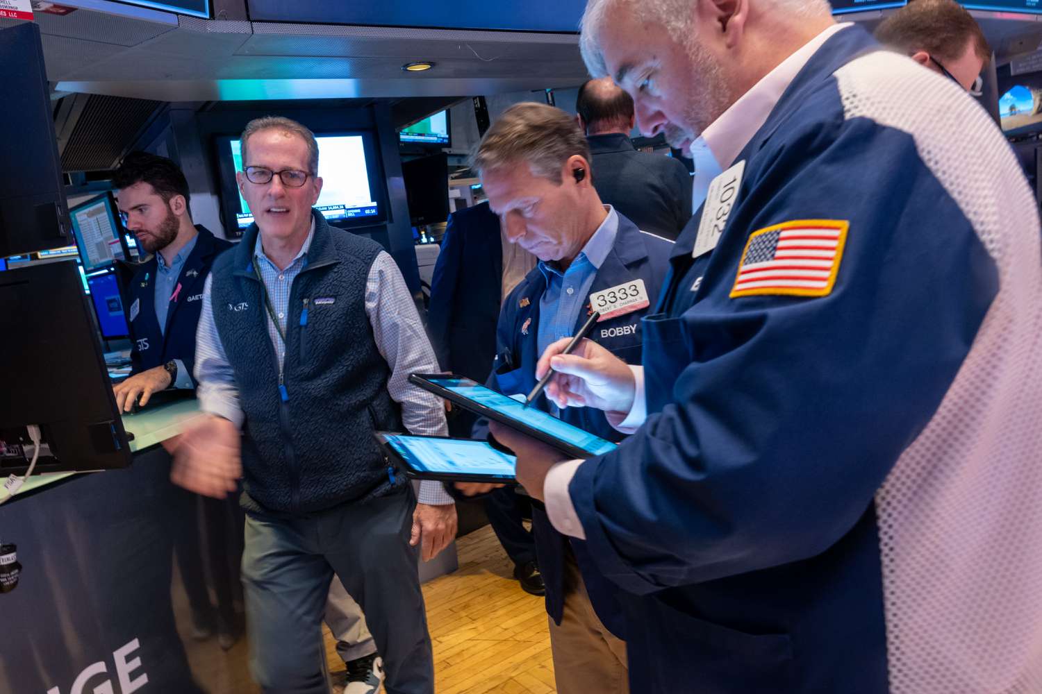 Traders work on the floor of the New York Stock Exchange (NYSE).