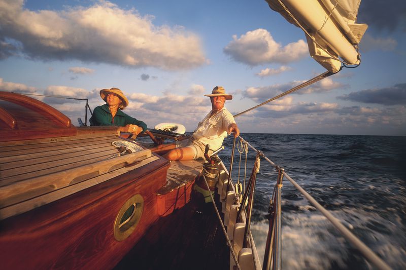 Senior couple sailing on a boat
