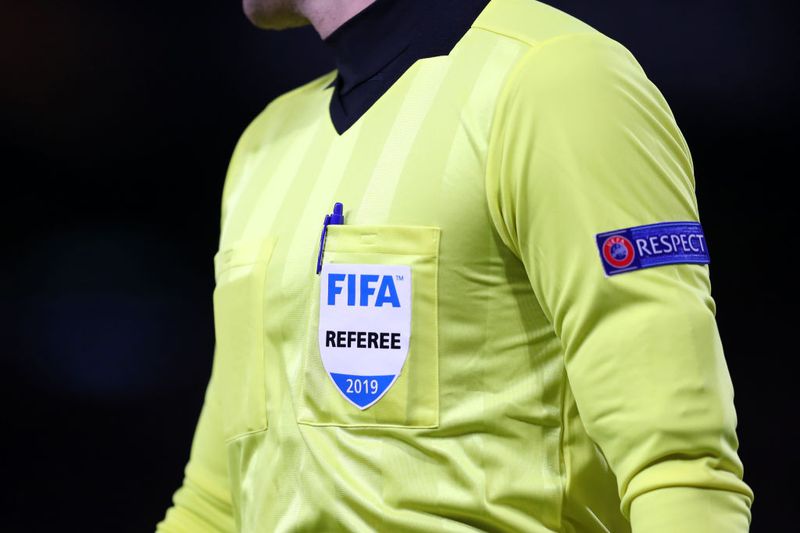 A detailed view of the FIFA referee badge during the UEFA Europa League.