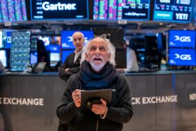 Traders work the floor of the New York Stock Exchange on Friday. 