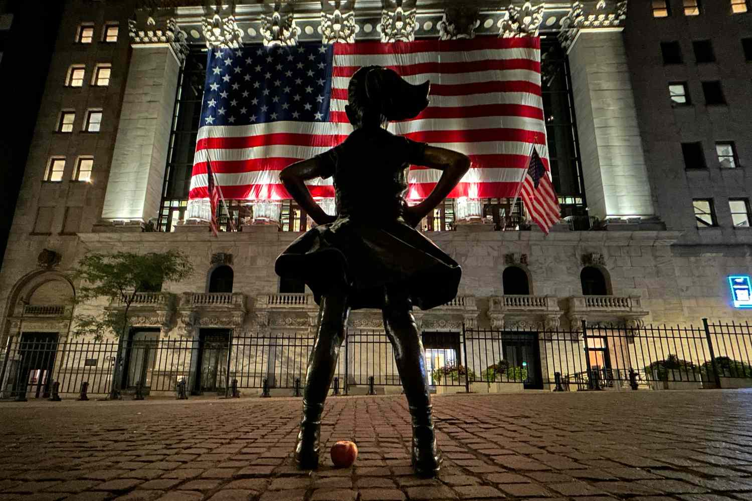 Photograph of "Fearless Girl" statue outside the New York Stock Exchange. 