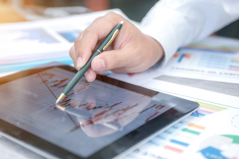 Businessman Show Analyzing Report, Business Performance Concept