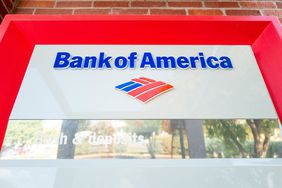 The Bank of America logo is seen on an ATM.