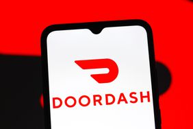 DoorDash logo is seen displayed on a smartphone screen