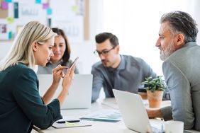 Colleagues in an office having a meeting