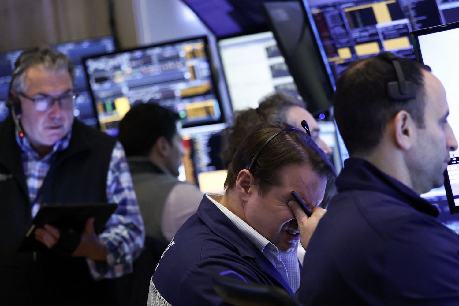 Traders work on the floor of the New York Stock Exchange 