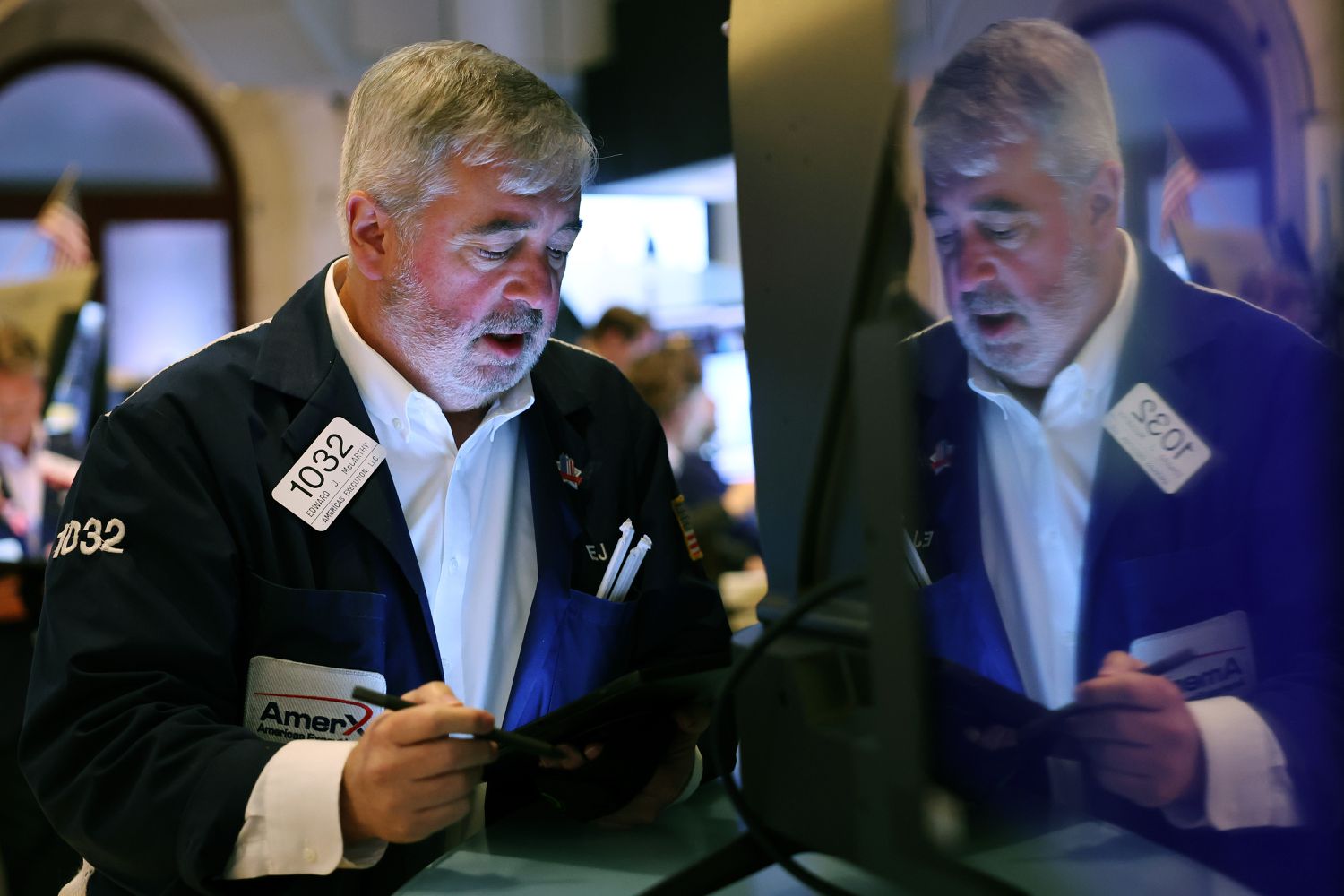 Traders work on the floor of the New York Stock Exchange.