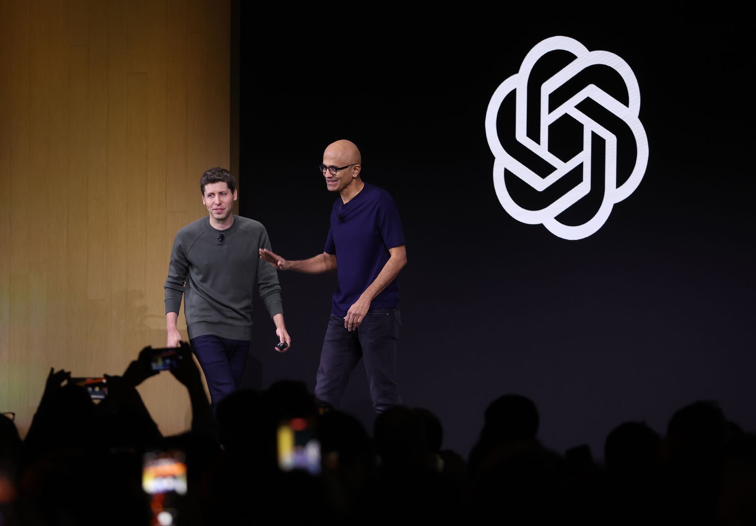 OpenAI CEO Sam Altman and Microsoft CEO Satya Nadella at an event.