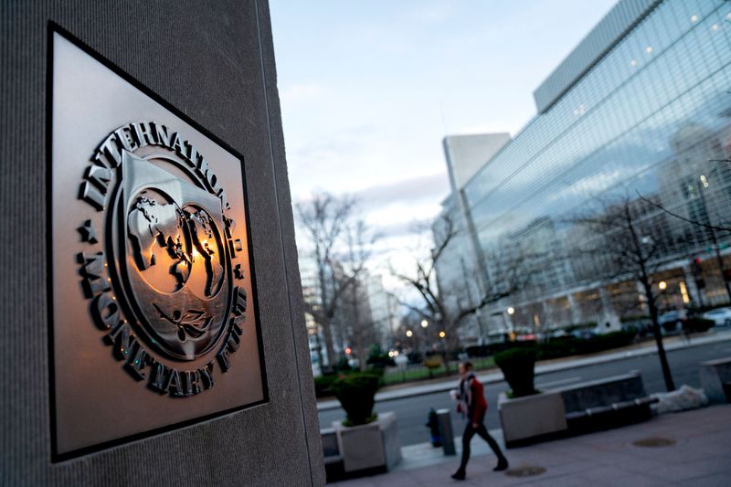 The International Monetary Fund seal on a building.
