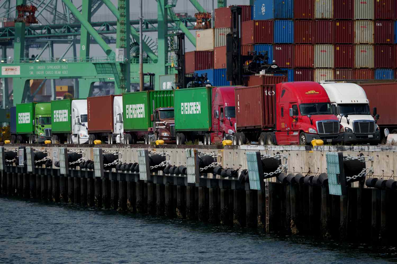 Trucks and shipping containers at the Port of Los Angeles in Los Angeles, California, US, on Thursday, April 24, 2025.