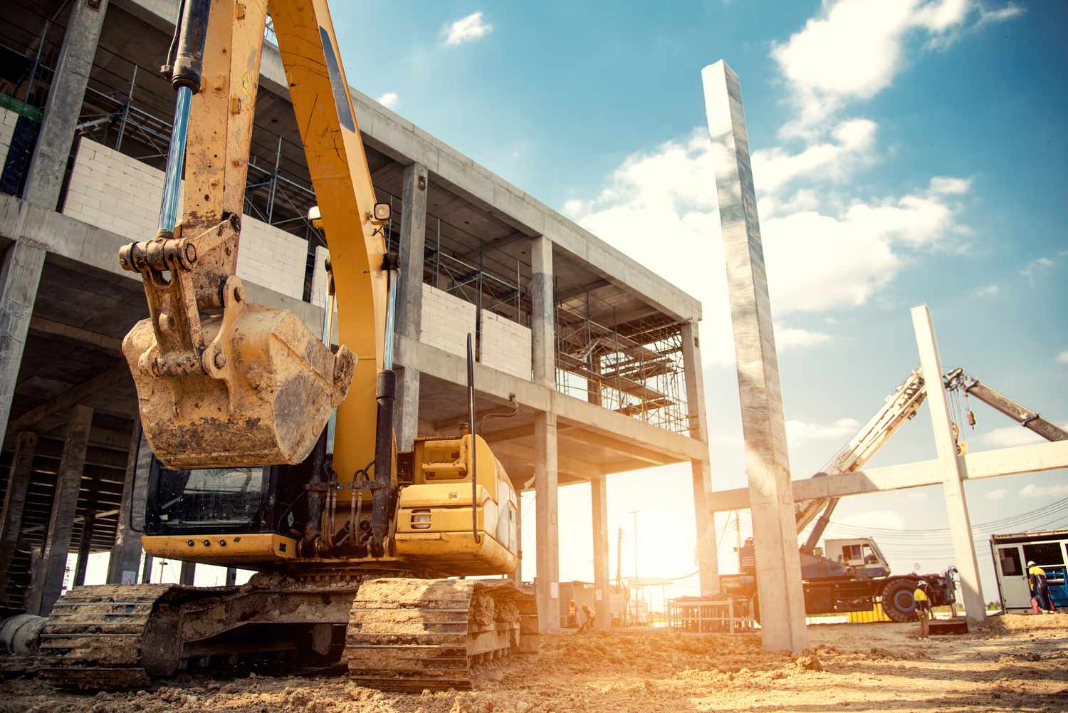 construction equipment in construction new warehouse background