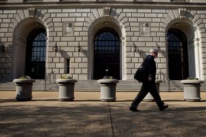 Man walks past the IRS building in Washington D.C.