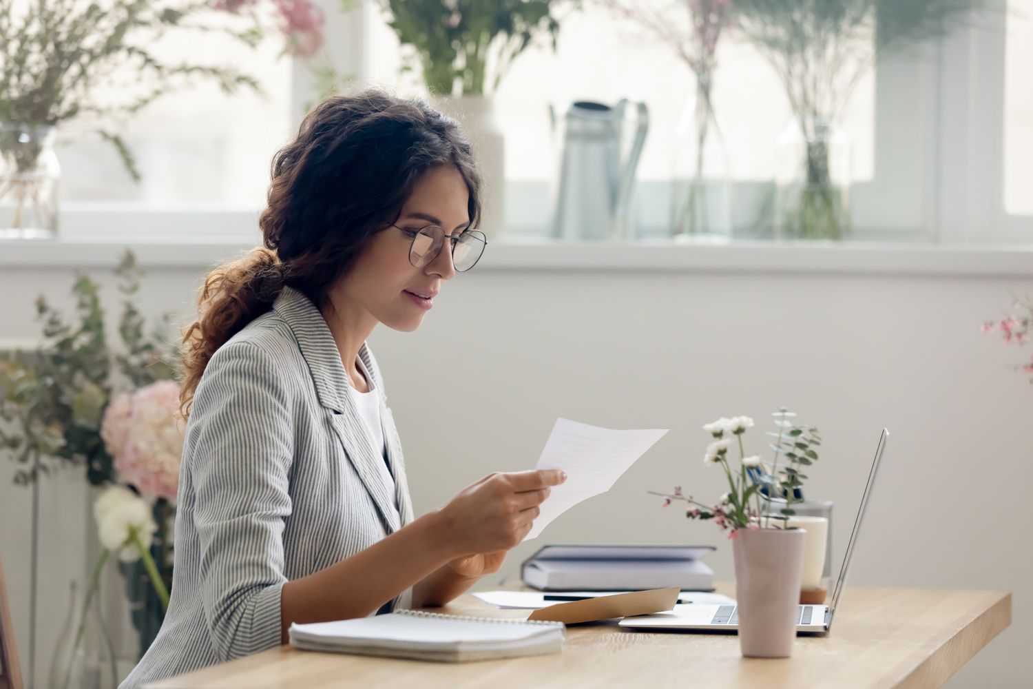Woman looks over personal loan rates